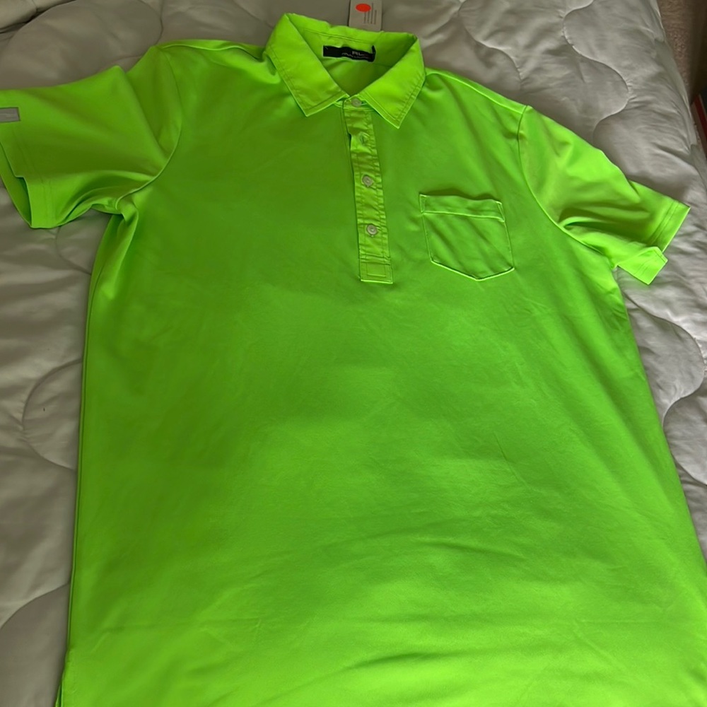Mens brand new Ralph Lauren polo, few stains pictured in photos. Never worn!